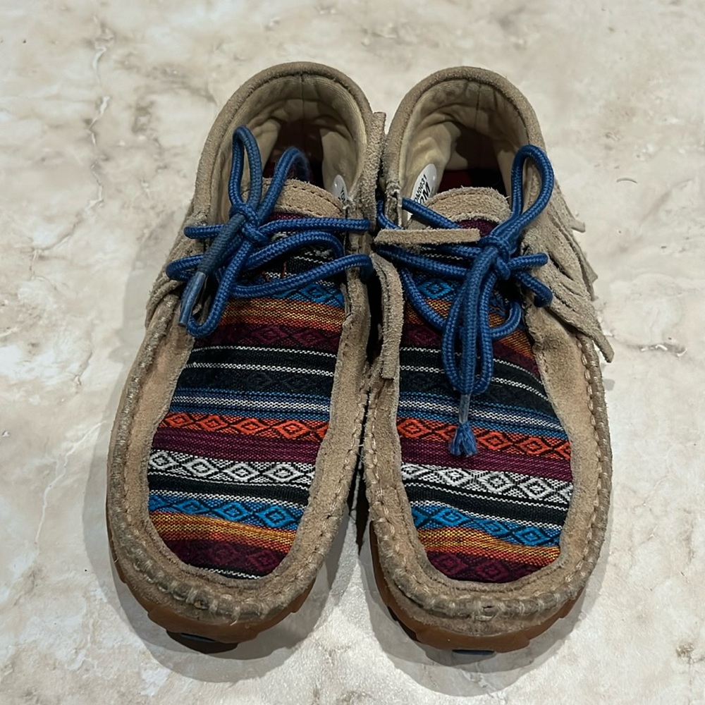 Twisted X fringe moccasin